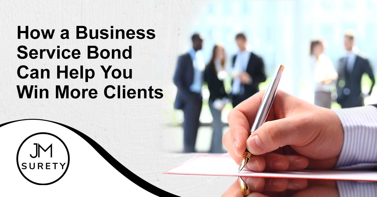 Image of a businessman signing a contract, featuring JM Surety and highlighting how a business service bond can help you win more clients by building trust and credibility.