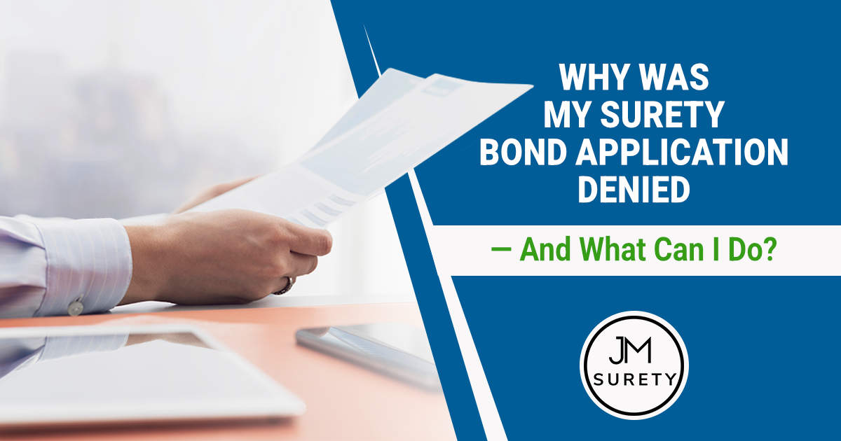 Why Was My Surety Bond Application Denied — And What Can I Do Businesswoman reviewing financial reports that may be evaluated during a surety bond application